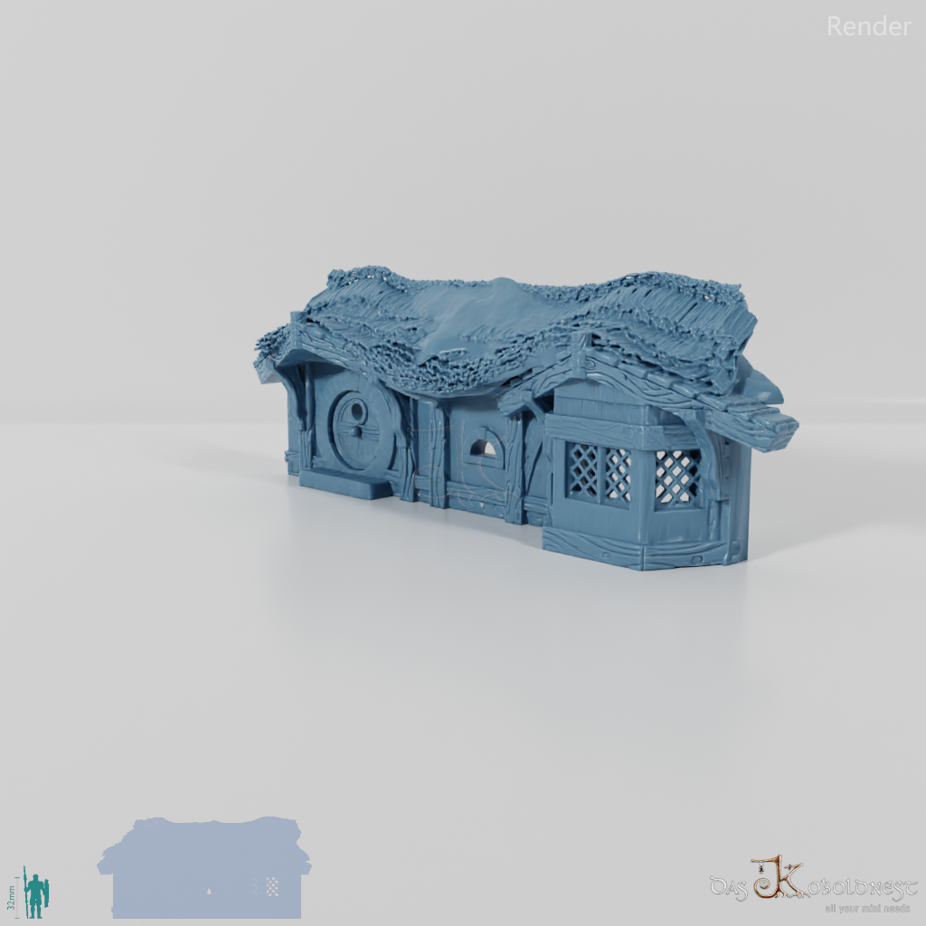 Halblinghöhlen-Fassade mit Stroh- und Erddach