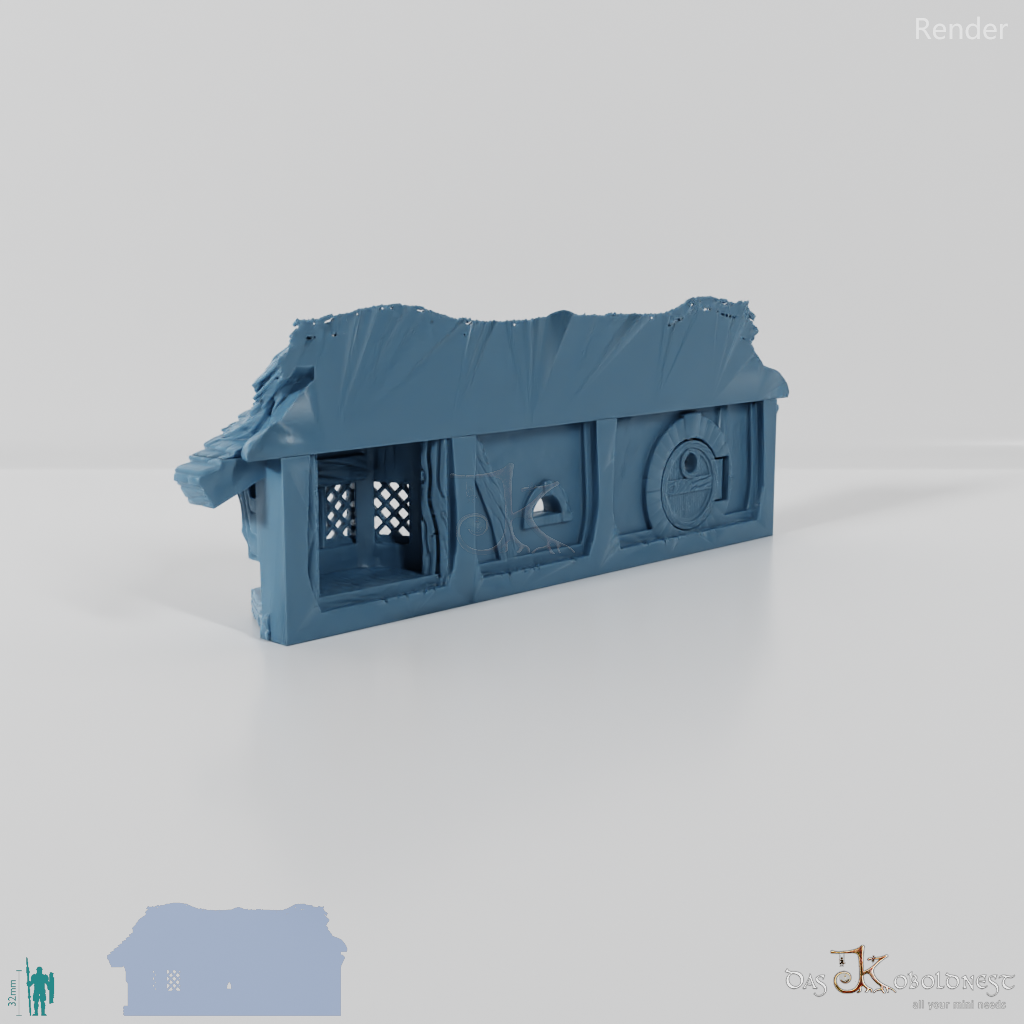 Halblinghöhlen-Fassade mit Stroh- und Erddach